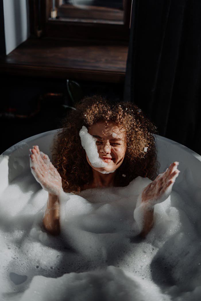 Woman in Bathtub With Water